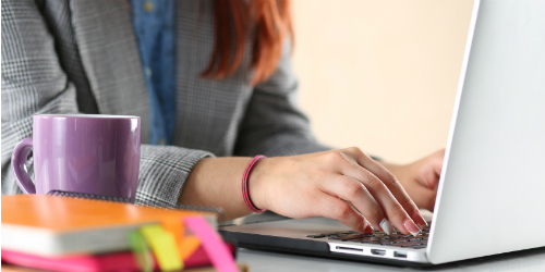 Business Woman Hands Working on Laptop