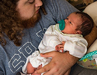 Father holding his baby