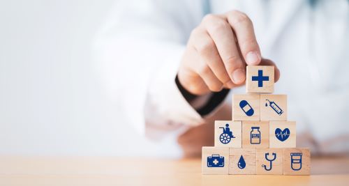 Medical images on blocks being stacked in a pyramid