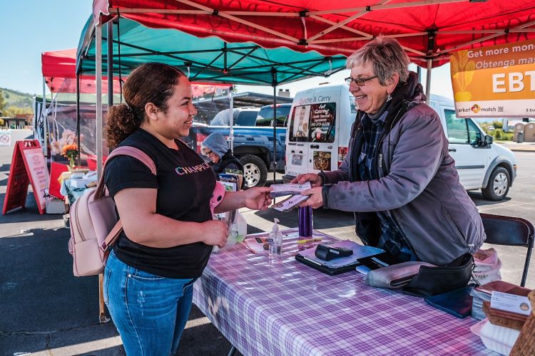 Food on table at a Farmer's market vendor booth