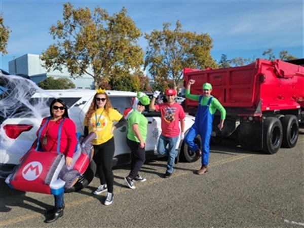 Probation staff in Mario Kart costumes at Trunk-or-Treat